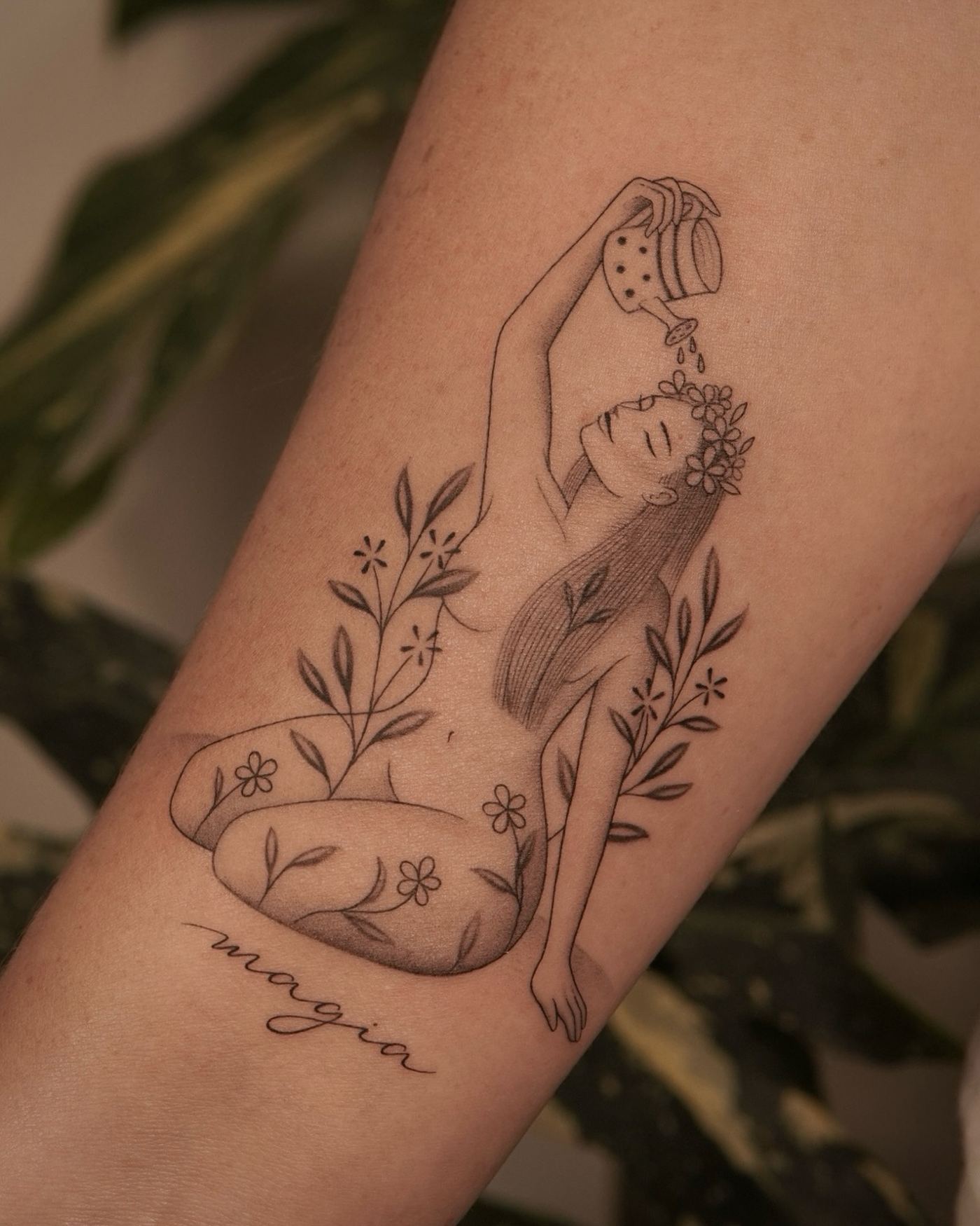 Black and white fine line tattoo of a woman watering flowers among plants, forearm